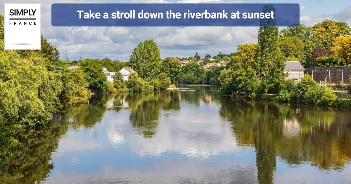 Take a stroll down the riverbank at sunset